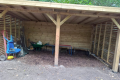 New wooden shelter, providing a sturdy, communal space for volunteers and visitors